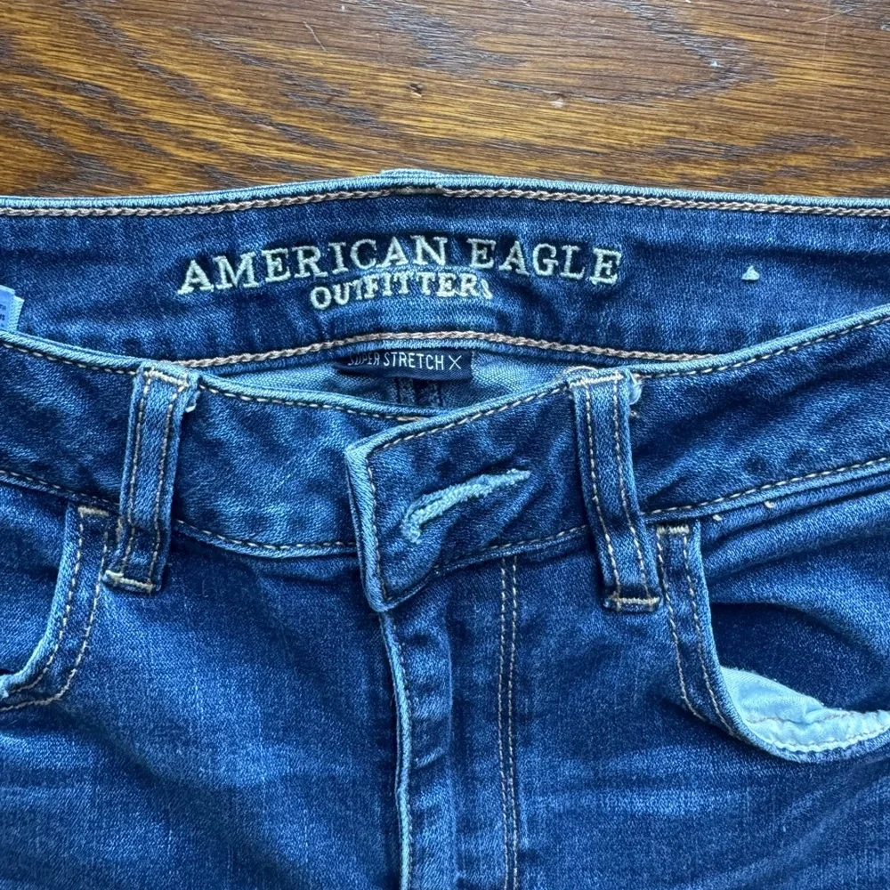 American Eagle Outfitters Dark Blue Distressed Skinny Jeans - Picture 3 of 6